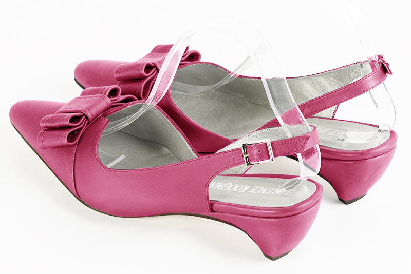 Fuschia pink women's open back shoes, with a knot. Tapered toe. Low wedge heels. Rear view - Florence KOOIJMAN